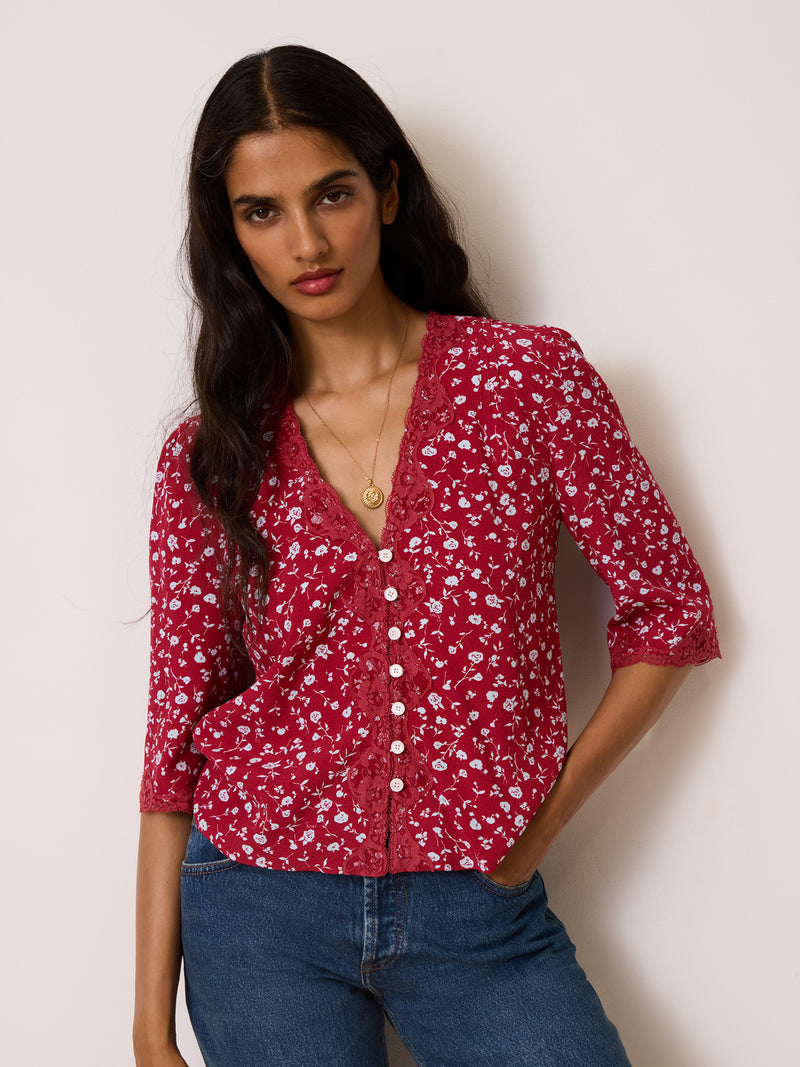 ALDA raspberry floral blouse with lace worn on a model by Rouje