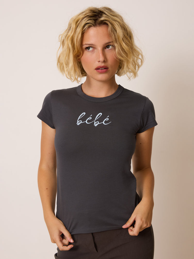 BEBE charcoal grey embroidered T-shirt worn on a model by Rouje