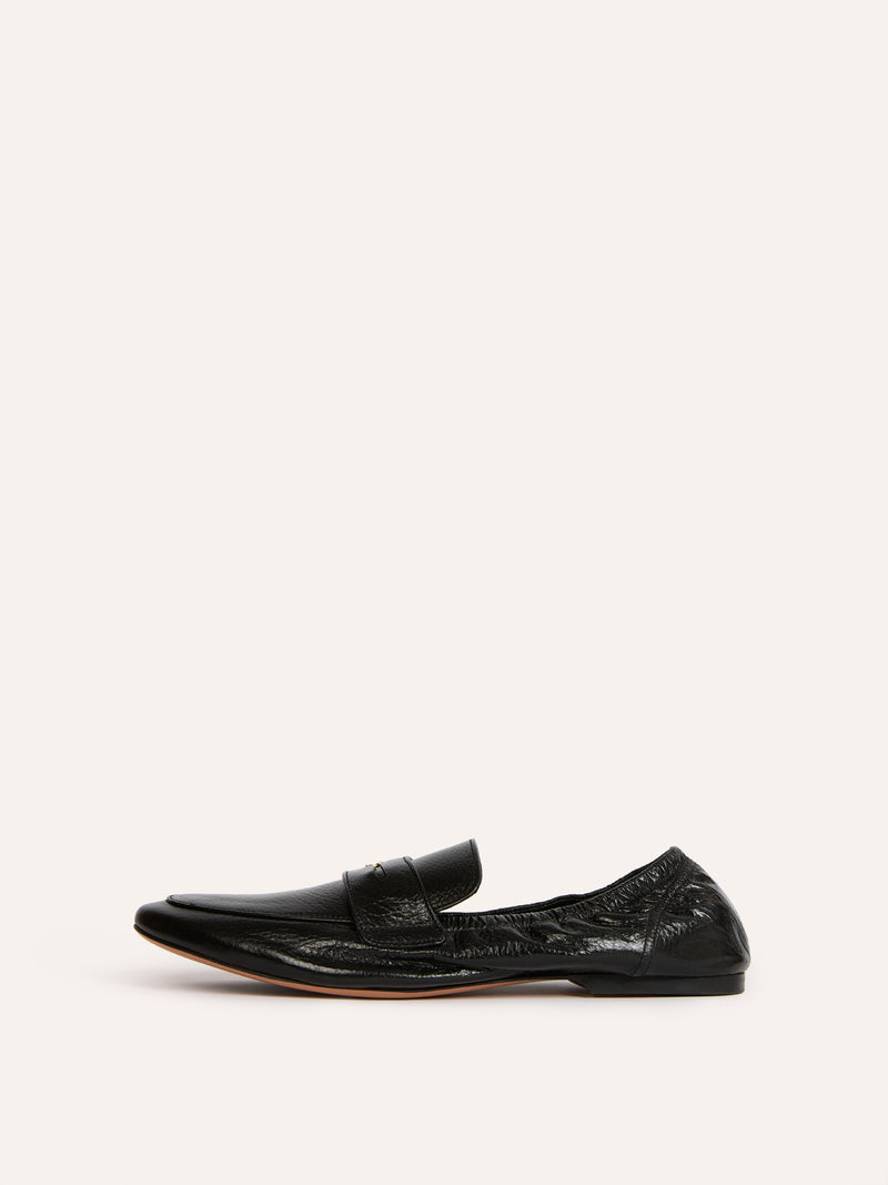 BROOKLIN black grained leather loafers worn on a model by Rouje