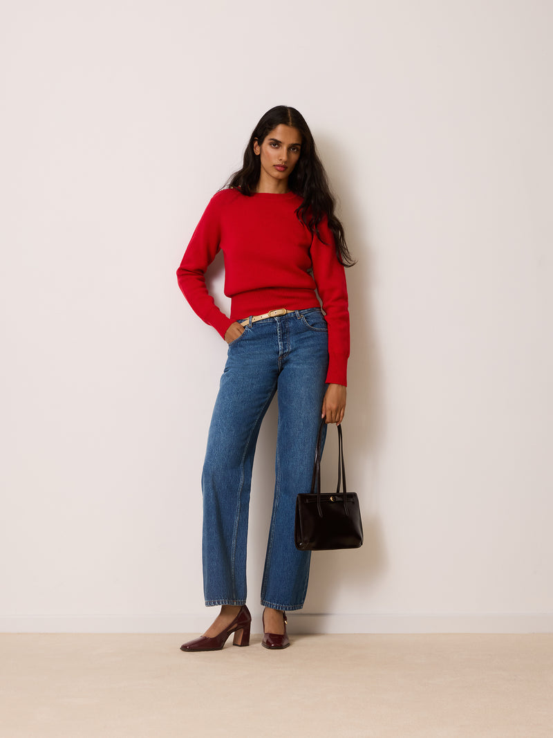 ERELL red merino wool sweater worn on a model by Rouje