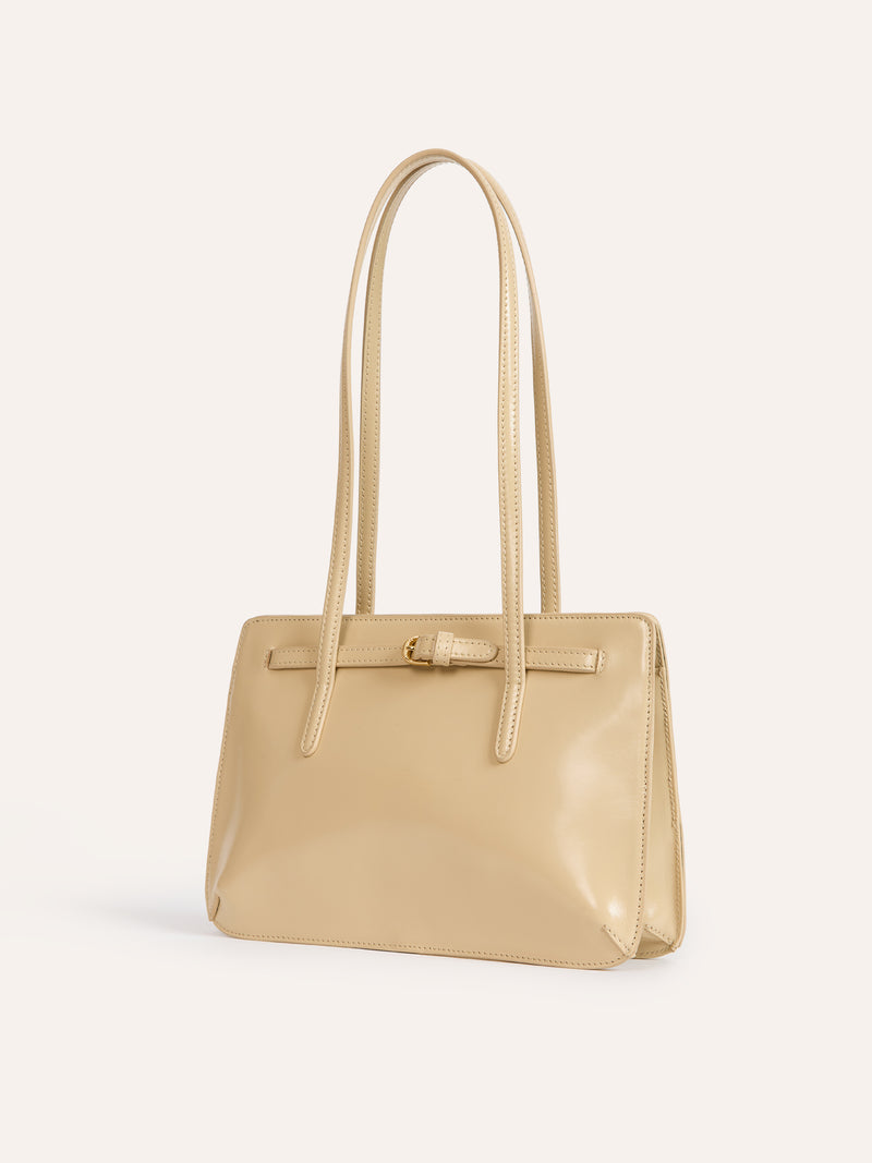 FIANCE champagne glazed leather handbag, back view by Rouje