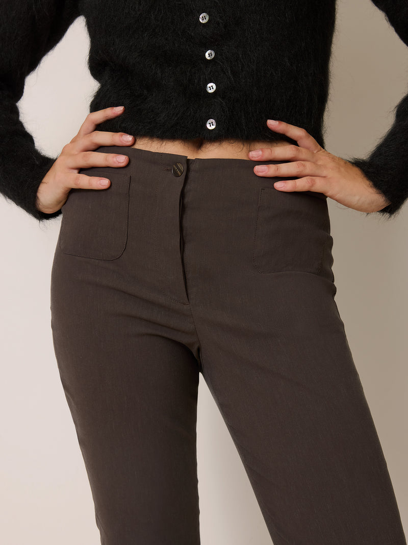 HARRY brown stretch cropped trousers worn on a model by Rouje