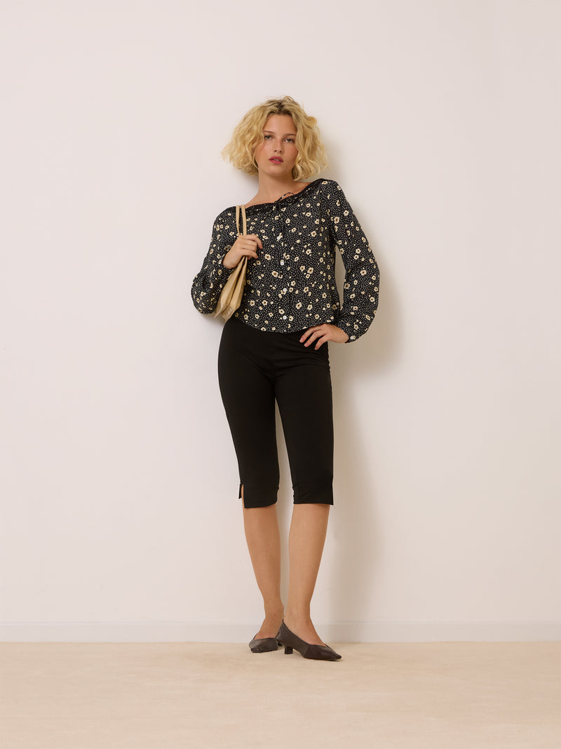 MAXIMIN black floral print blouse worn on a model by Rouje
