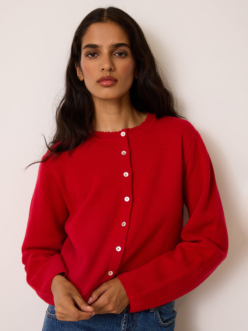 NATHALIE red merino cardigan worn on a model by Rouje