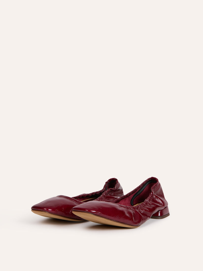 NINA burgundy patent leather ballet flats, back view showing R logo by Rouje